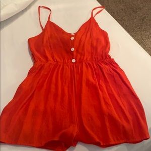 Red open back romper L